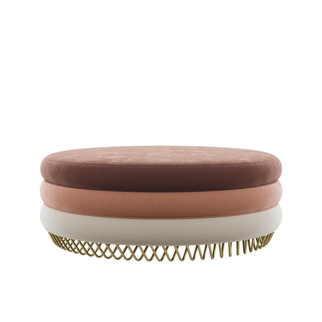 Wide-profile Audrey stool by Ottiu with three horizontal velvet layers in earth tones (brown, peach, and beige) elevated by a gold-toned criss-cross metal base.