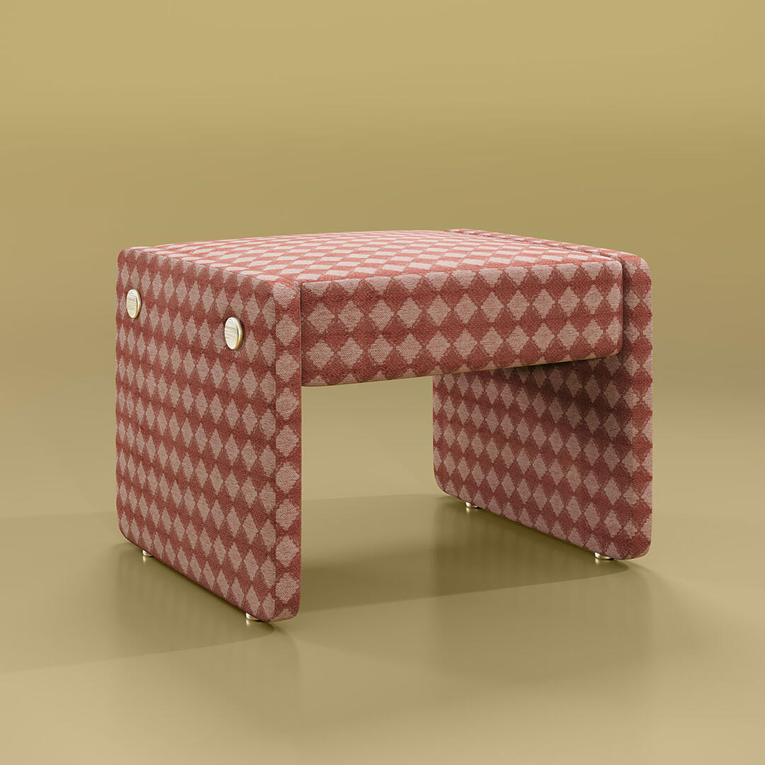 Elke Bench upholstered in Tarot Lychee patterned fabric by Kirkby, set against an olive background.