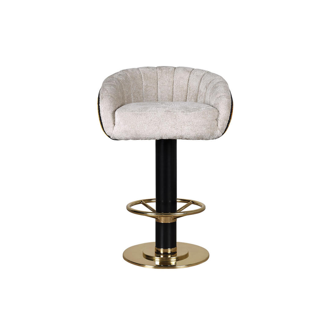 Vivien Swivel bar chair upholstered in Privé Melange fur velvet fabric by Aldeco in champagne, paired with Lullabird fabric by Casamance in yellow. Positioned facing the camera, it features a lacquered leg and brushed brass accents.