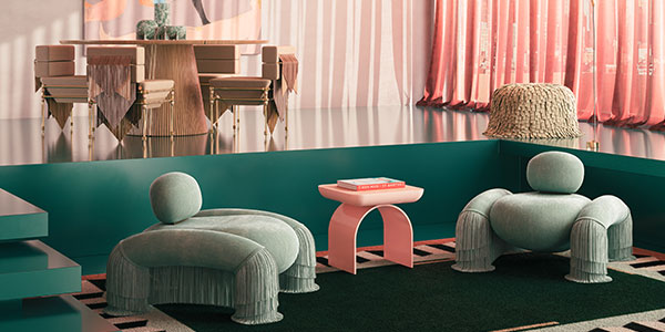 Reverie Collection living room setting with pink and green hues, with the Lyra Ottoman, the Odessa armchair, California Side Table in pink, Almond Pendant Lamp, Seraphine Dining Chair, and Henry Dining Table. The room features a large window with sheer pink curtains.