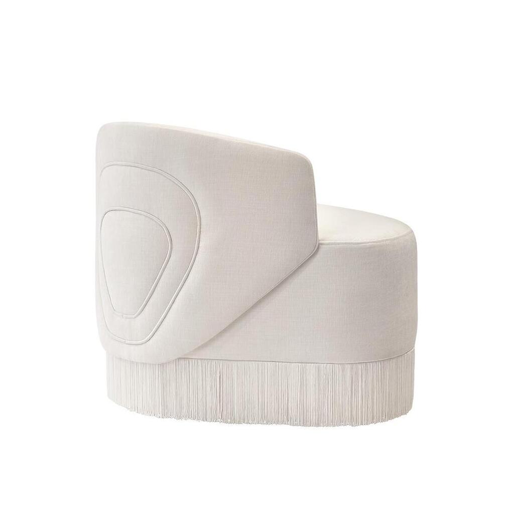 White Doris Armchair in chenille with tricotine fringes, shown from the back at a 45-degree angle on a white background.