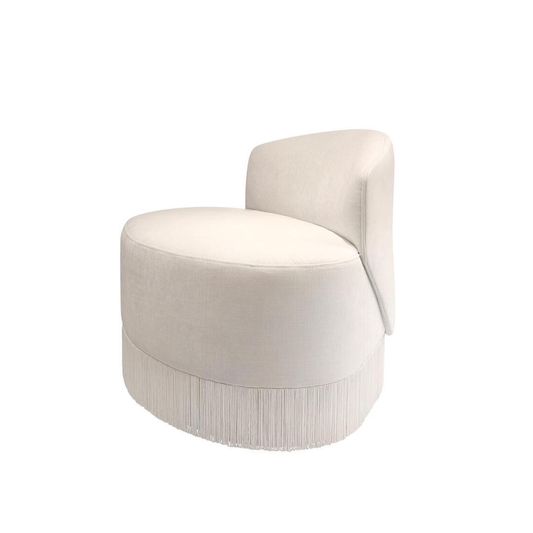 White Doris Armchair in chenille with tricotine fringes, shown from the front at a 45-degree angle on a white background.