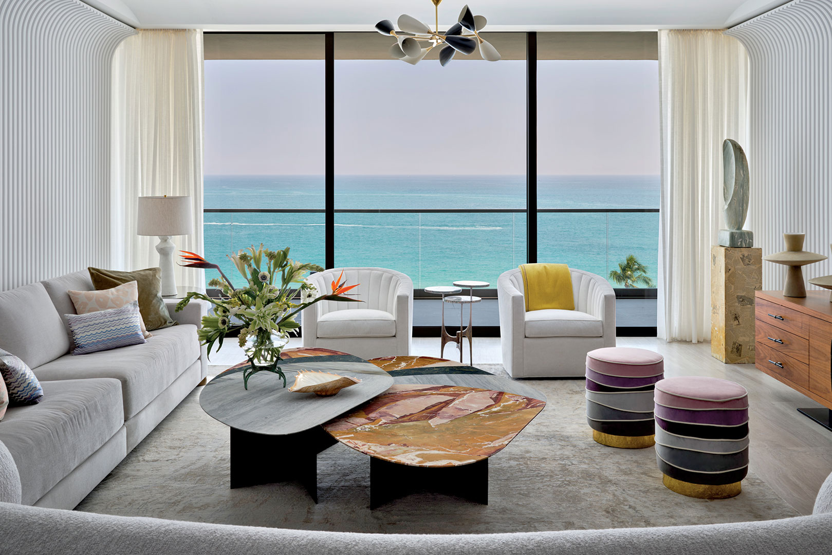 Miami Residential Project living room overlooking the sea, featuring two Charisse stools.