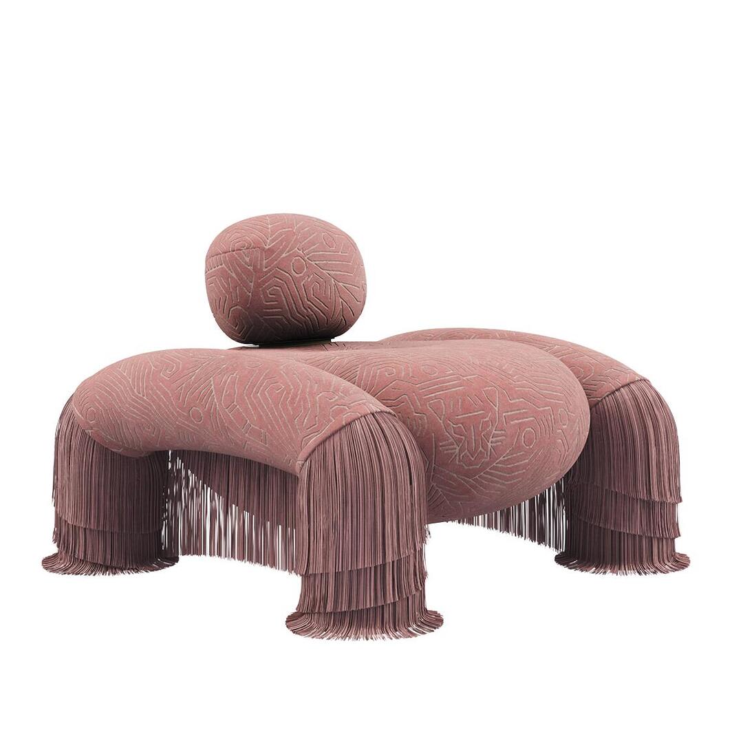 Odessa armchair at a 45-degree angle, upholstered in Darwinista 004 fabric with exotic visions pattern on jacquard velvet and pink fringes