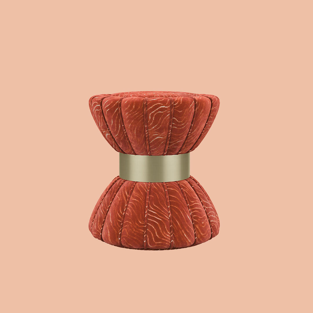 Colette Stool by Ottiu upholstered in vibrant orange patterned Casamance fabric, featuring a brushed brass base—an elegant fusion of bold texture and refined metallic detail.