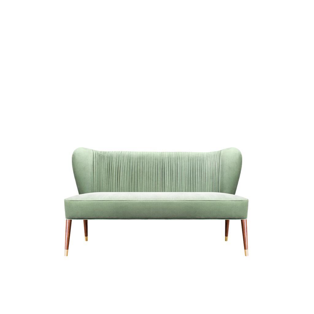 Fully upholstered in velvet with smoked walnut wood legs carefully crafted with polished brass details and gold studs, Visconti twin seat by Ottiu will perfectly suit any hotel project or living set.