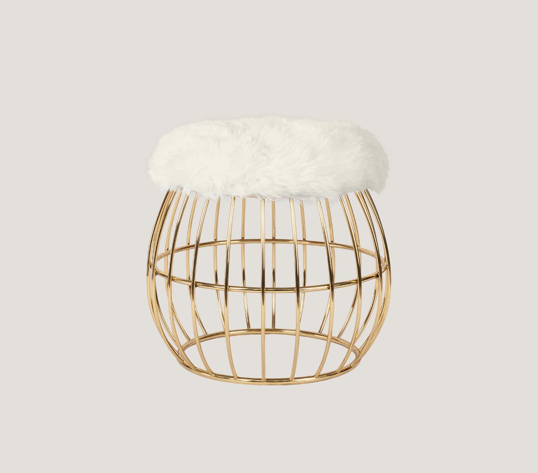 Andy Stool with a Cloud Dancer fur seat and polished brass structure.
