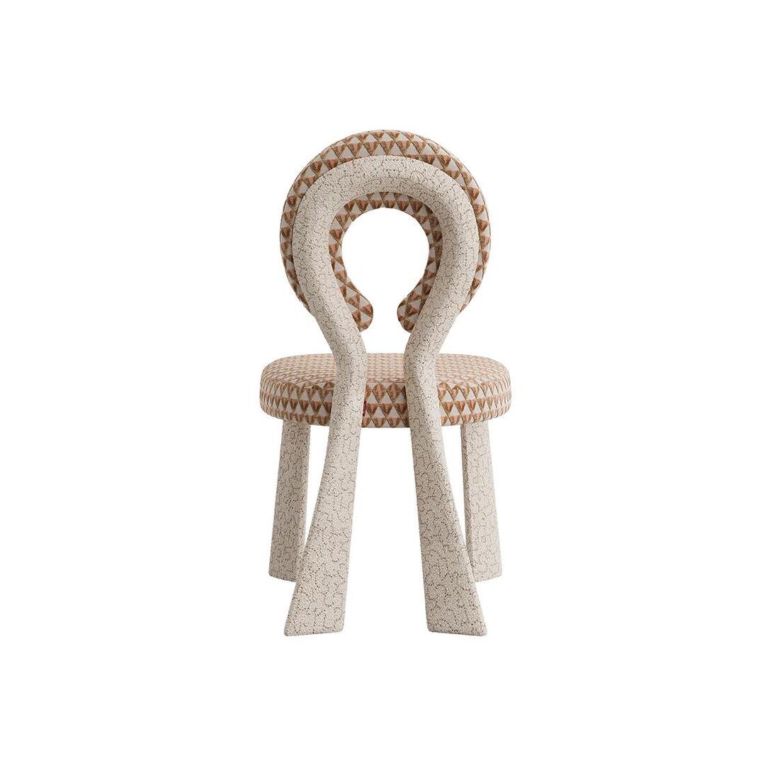 Direct rear view of the Mary Dining Chair, showcasing the elegant "keyhole" silhouette created by the bouclé-wrapped frame.