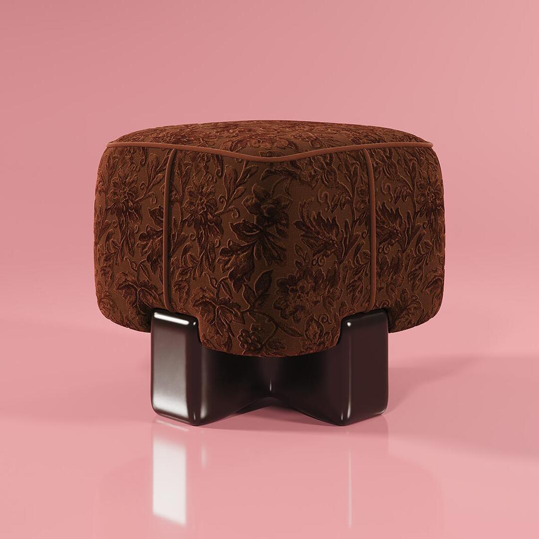 A close-up lifestyle shot of the Pola Stool in terracotta velvet, set against a soft pink backdrop that reflects off the high-gloss finish of its architectural base.