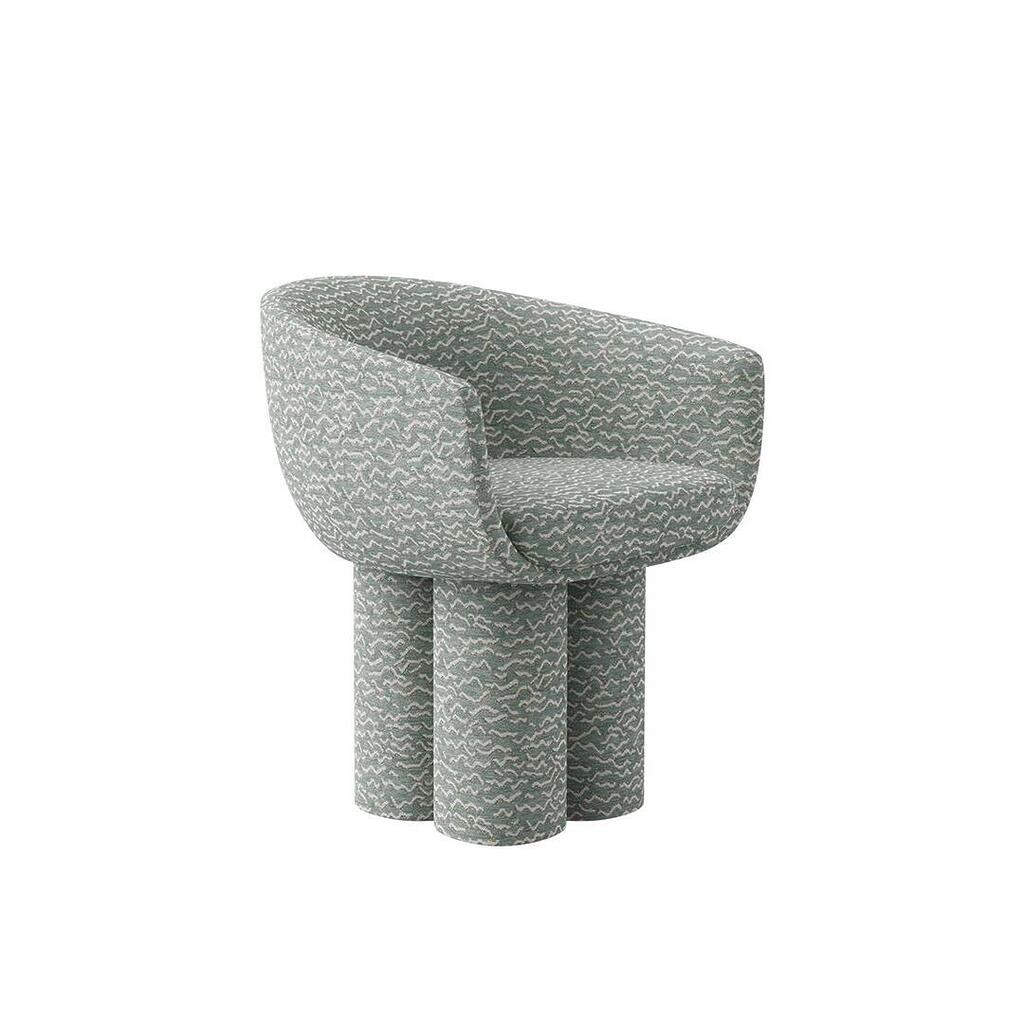 A three-quarter front view of the Mae Dining Chair, demonstrating its curved shape and the plush, rounded seat. The "Pierre Frey - Le chant des dunes - Aqua" fabric pattern is clearly visible across the entire structure.