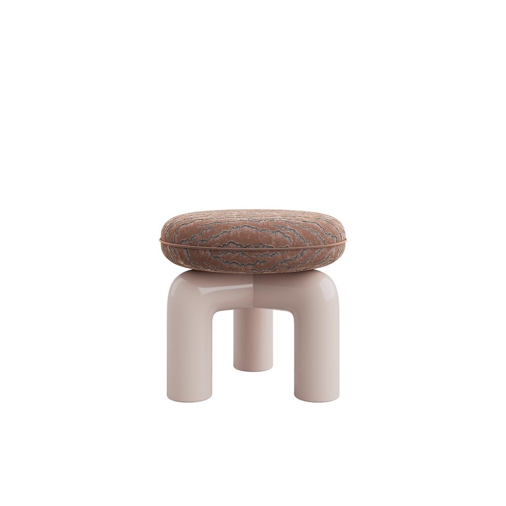 Straight-on eye-level view of the Tamara Stool by Ottiu. The stool displays a rounded, thick seat in a rich brown velvet fabric detailed with dark, rippling embroidered textures. The smooth, shiny base consists of bold, tubular arches in a soft, pale pink lacquered wood finish, creating a modern, architectural look.