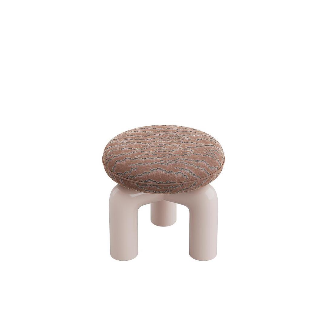 Front-facing, slightly elevated view of the Tamara Stool by Ottiu. It features a plush, round, cushion-like seat upholstered in a textured, brown embroidered velvet with dark, organic wavy patterns. The seat is supported by a sculptural base made of three thick, glossy, light beige or pale pink lacquered wood tubular legs that curve inward at the top to meet under the cushion.