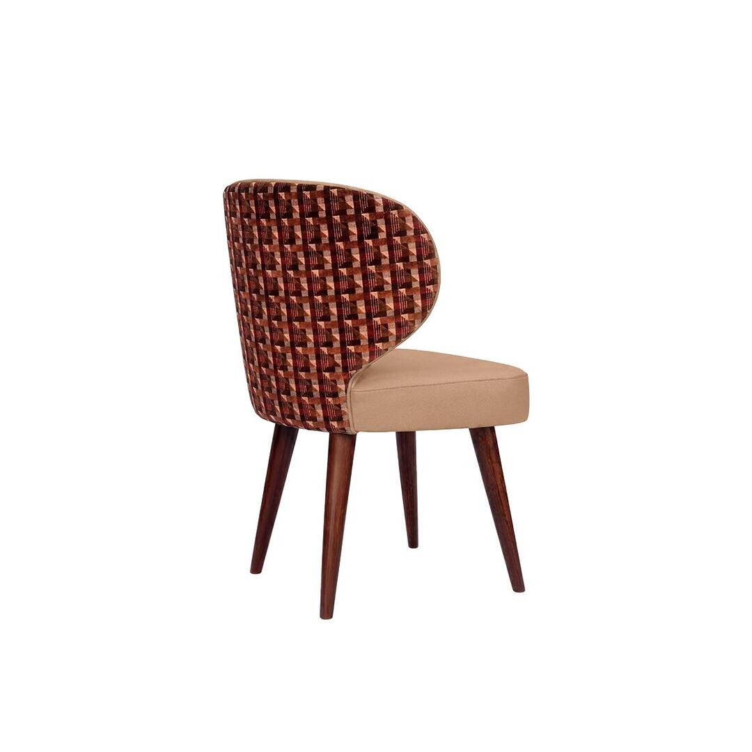 Designed without metal accents, the Louis II Dining Chair highlights the beauty of its clean lines and premium materials.